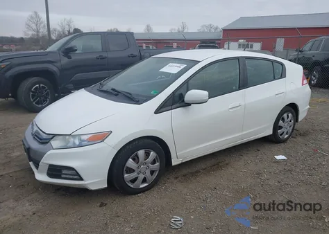 2012 Honda Insight z USA, uszkodzony, nr VIN JHMZE2H3XCS000193